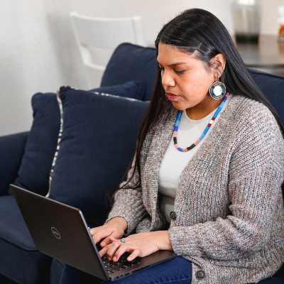 Indigenous woman on laptop